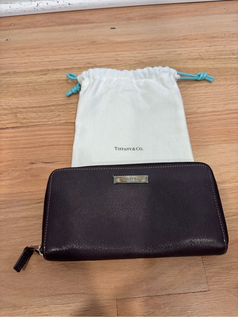 Tiffany & Co. deep purple/gray leather zip-around continental wallet